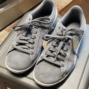 Puma women’s Gray and white Sneakers